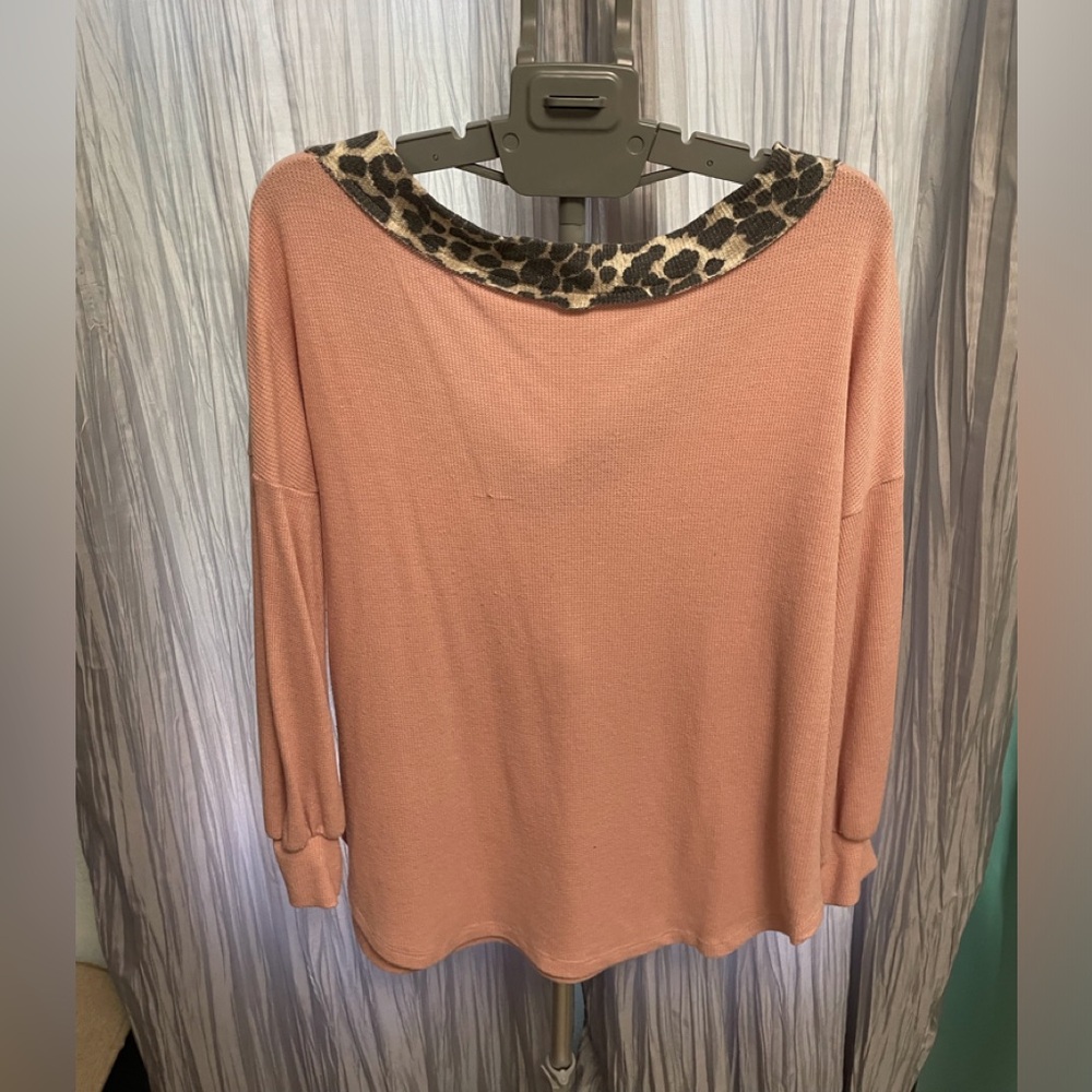 Peachy/Pink leopard trim neckline. Low Back blouse